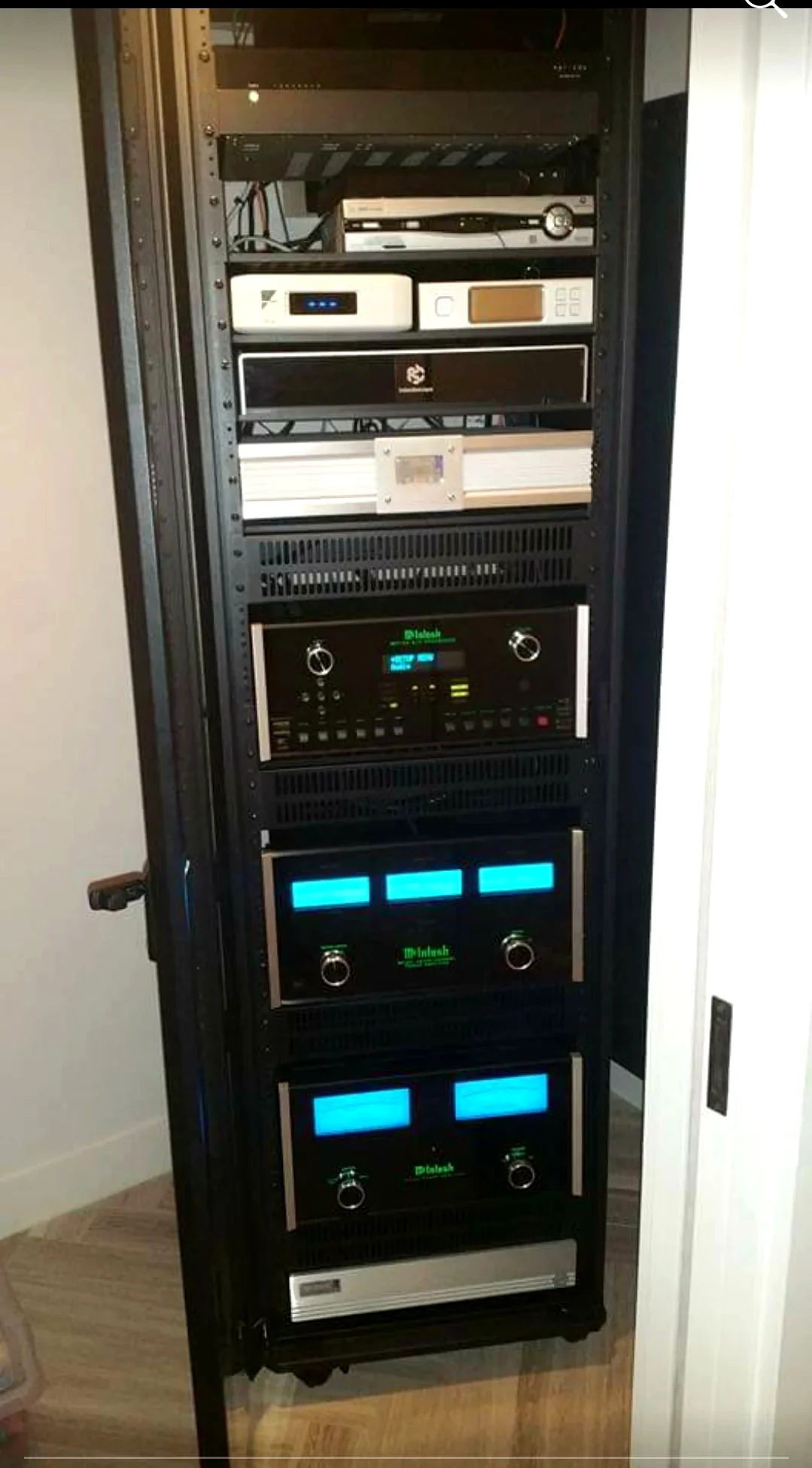 Serviceable AV rack with power, cabling, source gear, and networked AV infrastructure for Houston AV service and system recovery